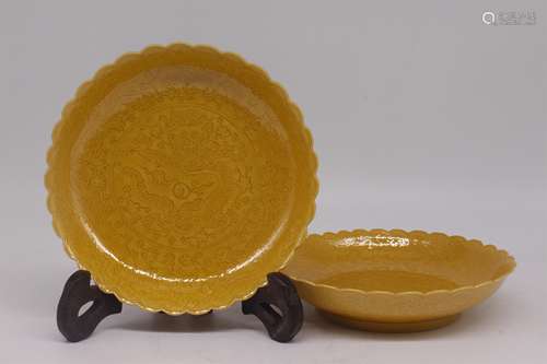 A Pair of Chinese Yellow Glazed Porcelain Carved Plates