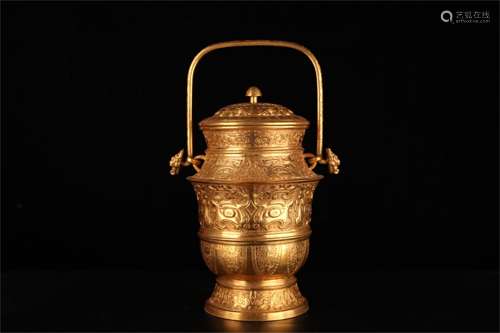 A Chinese Gilt Bronze Pot with Handle and Cover