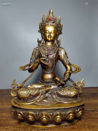 A Chinese Bronze Figure of Buddha with Gemstone Inlaid