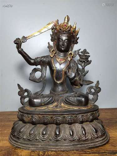 A Chinese Bronze Figure of Buddha with Gemstone Inlaid