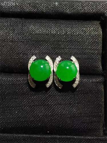 A Pair of Chinese Carved Jadeite Earrings