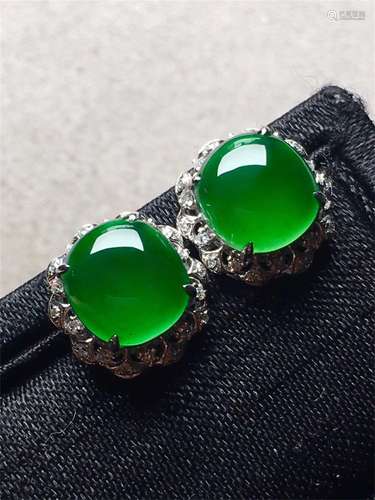 A Pair of Chinese Carved Jadeite Earrings