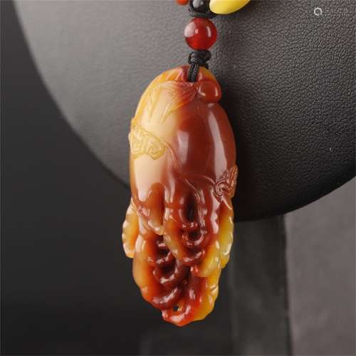 A Chinese Carved Stone Necklace