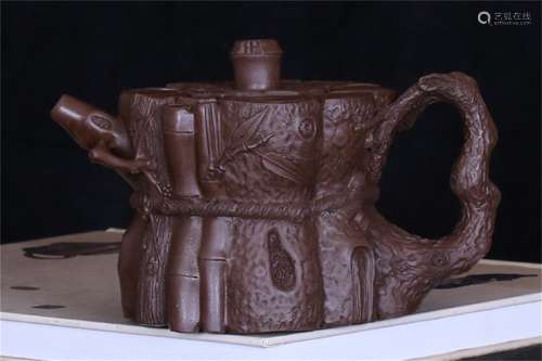 A Chinese Carved Yixing Clay Teapot