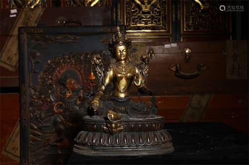 A Chinese Gilt Bronze Figure of Buddha