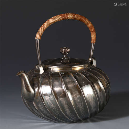 A CHINESE PURE SILVER CARVED LONG HANDLE KETTLE