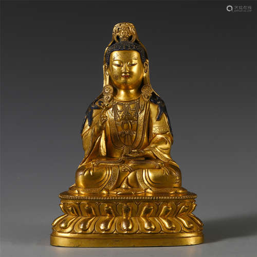 A CHINESE GILT BRONZE SEATED GUANYIN ON LOTUS