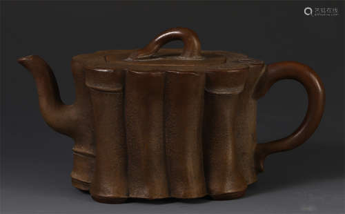 A CHINESE ZISHA CLAY CARVED BAMBOO TEAPOT