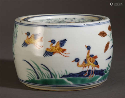 A SMALL CHINESE DOUCAI PORCELAIN JAR