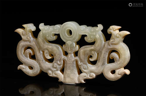 A CHINESE CARVED JADE OPENWORK BEAST TABLE ITEM