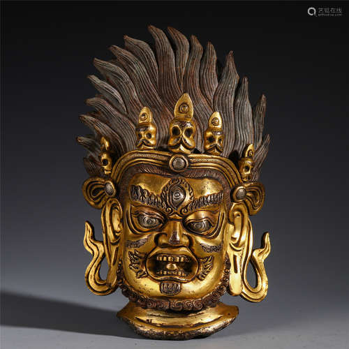 A CHINESE GILT BRONZE INLAID SILVER BUDDHA HEAD