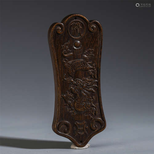 A CHINESE AGALWOOD CARVED DRAGON PATTERN PLAQUE