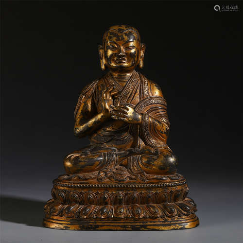 AN UNUSUAL CHINESE GILT BRONZE SEATED TARA