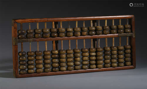 A CHINESE HARDWOOD CARVED ABACUS