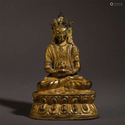 A CHINESE GILT BRONZE SEATED BUDDHIST