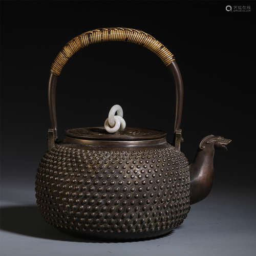 A CHINESE SILVER CARVED LONG HANDLE KETTLE