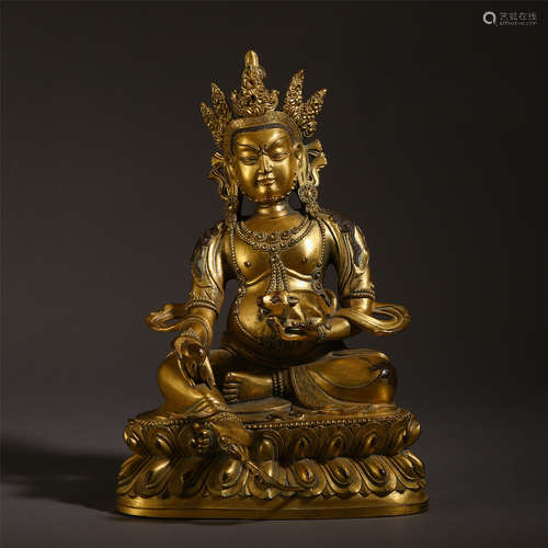 A CHINESE GILT BRONZE SEATED JAMBHALA