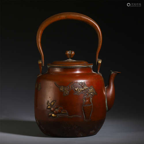 A CHINESE BRONZE CARVED FLOWER LONG HANDLE KETTLE