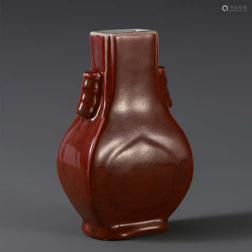 A CHINESE PORCELAIN RED GLAZE ARROW VASE