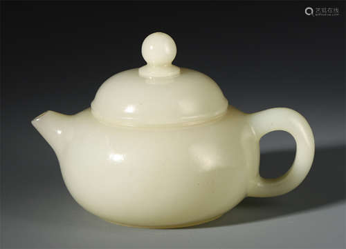 A CHINESE ANCIENT JADE CARVED TEAPOT