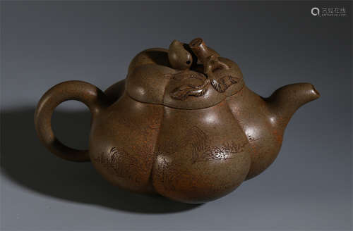 A CHINESE ZISHA CLAY CARVED POEM TEA POT