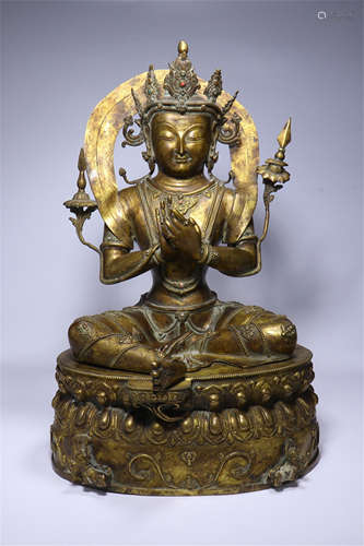 A CHINESE GILT BRONZE SEATED TARA ON LOTUS