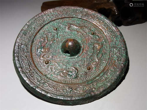 A CHINESE ANCIENT BRONZE CARVED ROUND MIRROR