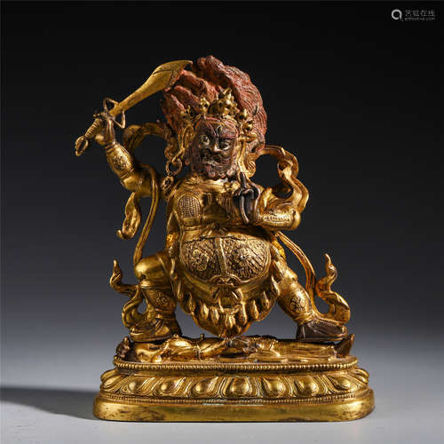 A CHINESE GILT BRONZE BUDDHIST GUARDIAN STANDING