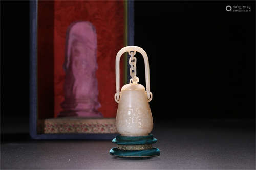 HETIAN JADE CARVED 'TAOTIE MASK' HANGING VASE WITH LID