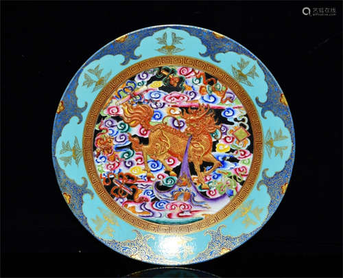 FAMILLE ROSE TURQUOISE GROUND AND GILT 'QILIN' DISH