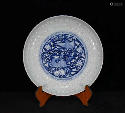 BLUE AND WHITE CARVED 'PHOENIX AND QILIN' CHARGER