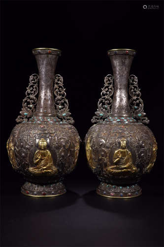 PAIR OF SILVER GILT AND CARVED 'BODHISATTVA' VASES WITH HANDLES