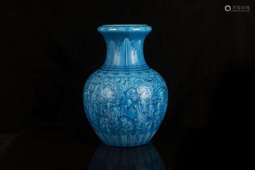 MONOCHROME BLUE GLAZED AND CARVED 'FLOWERS' VASE