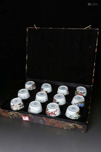 SET OF TWELVE FAMILLE ROSE 'FLOWERS' CUPS