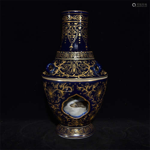 BLUE GLAZED AND GILT OPEN MEDALLION TWIST VASE