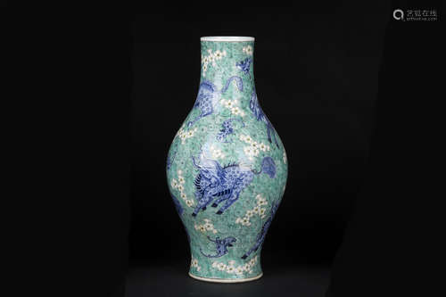 BLUE AND WHITE GREEN GROUND 'QILIN' OLIVE SHAPED VASE