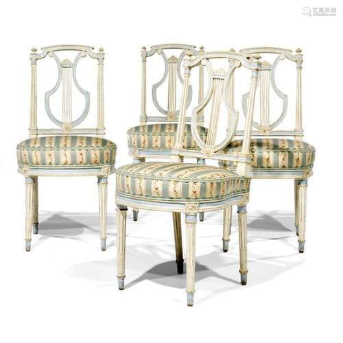 FOLLOWING FOUR LYRE BACKREST CHAIRS IN GENDAR'S HATCH IN THE TASTE OF JACOBEAN GEORGE LOUIS XVI AND TWO POSTER EQUIPMENT MODELS IN WHITE WOODEN REPLACED WOOD, blue rechampi, moulded and carved with rosettes, roughened flutes and grooves. Buttoned uprights of the backrest. Horseshoe seat. Tapered legs. Louis XVI period. Blue-white striped silk upholstery decorated with garlands of leafy flowers.