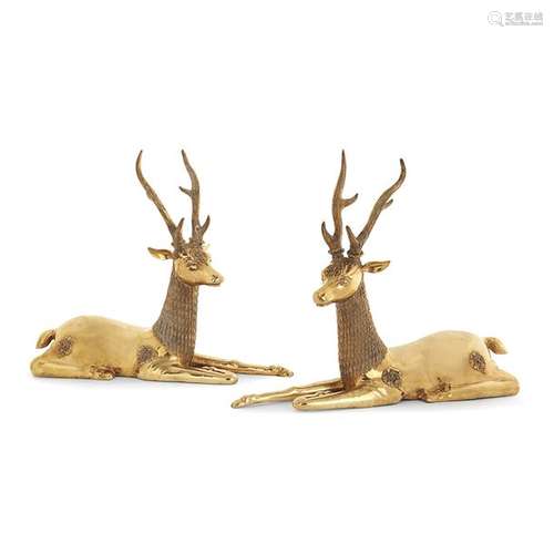 PAIR OF GILT BRONZE DEERSThey come lying down, one leg folded upA pair of gilt-bronze deers in the Oriental manner workHIGH: 52 CM - LONG. 62 CM - HEIGHT 20 1/2 X WIDTH 24 7/16 IN.