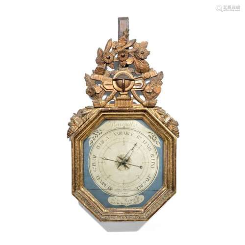 HEXAGONAL BAROMETER, END OF THE ERA LOUIS XVI in moulded, carved and gilded wood. The openwork pediment decorated with a globe in a frame of foliated and flowered branches falling down. By Landar/Optician Passage du Caire/A Paris/Selon Toricelly