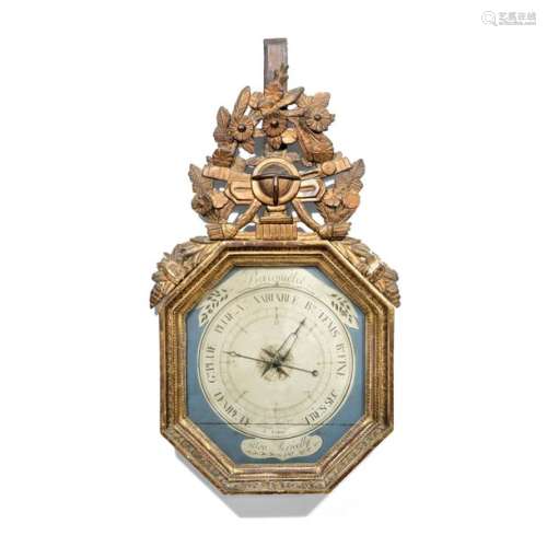 HEXAGONAL BAROMETER, END OF THE ERA LOUIS XVI in moulded, carved and gilded wood. The openwork pediment decorated with a globe in a frame of foliated and flowered branches falling down. By Landar/Optician Passage du Caire/A Paris/Selon Toricelly