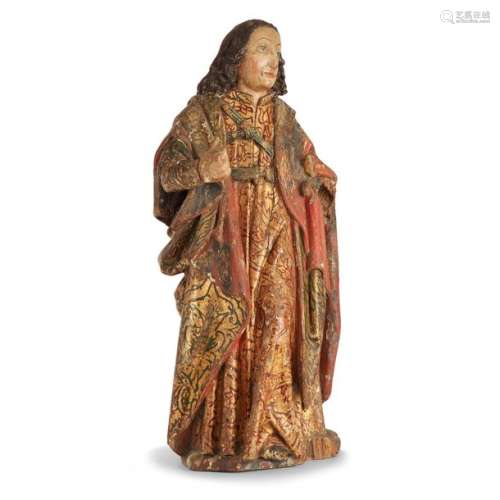 YOUNG MAN IN COURT LIVING, NORTHERN SPAIN, BEGINNING OF THE XVI CENTURY A polychrome wooden statue in a long and ample coat, bare head and sword at the side