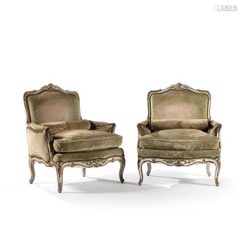 PAIR OF LOUIS XVCIRCA STYLE LOUIS BERGERIES 1900of eventful shape, with flat curved backrest, in green and gold lacquered beechwood, decorated with foliage flowers underlined with combed 