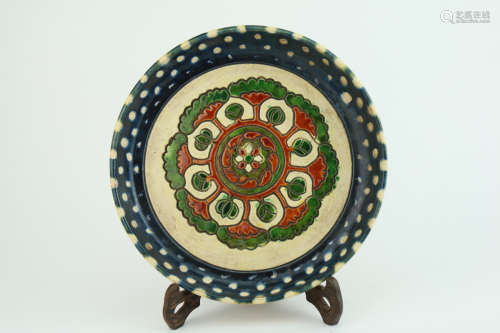 Tri colored glazed pottery plate