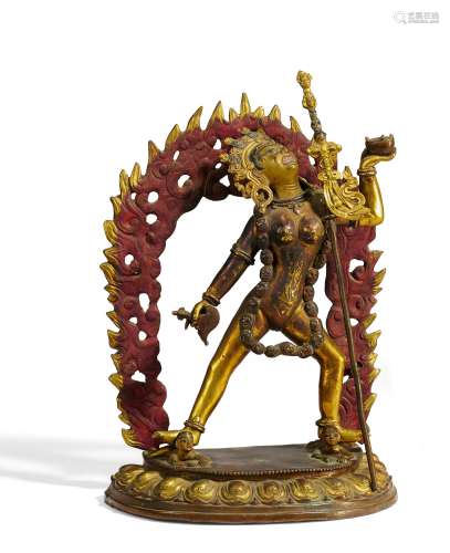 LARGE FIGURE OF THE DAKINI VAJRAYOGINI. Origin: Tibet. Technique: Old fire gilt bronze figure.