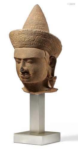 HEAD OF A CROWNED GODDESS. Origin: Khmer. Dynasty: Angkor Wat period (1100-1175). Date: 12th c.