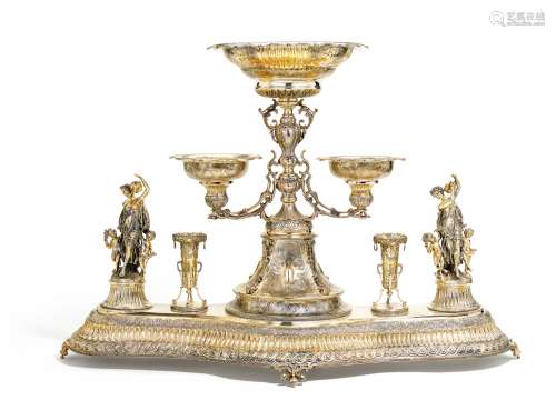 MONUMENTAL, PARTLY GILT SILVER CENTREPIECE WITH BACCHANTS MAKING MUSIC. Presumably Germany. Date:
