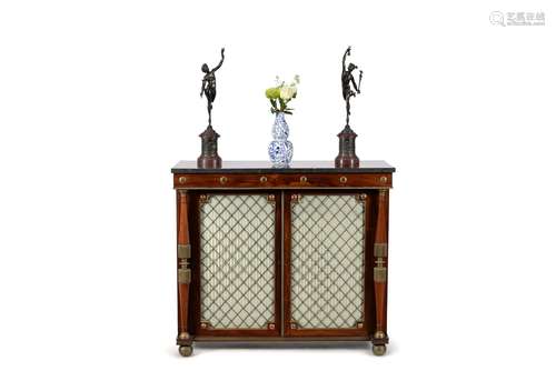 ϒ A matched pair of rosewood and gilt metal mounted side cabinets, circa 1815