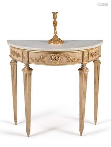 A pair of Continental cream painted and parcel gilt demi-lune console tables, late 18th century