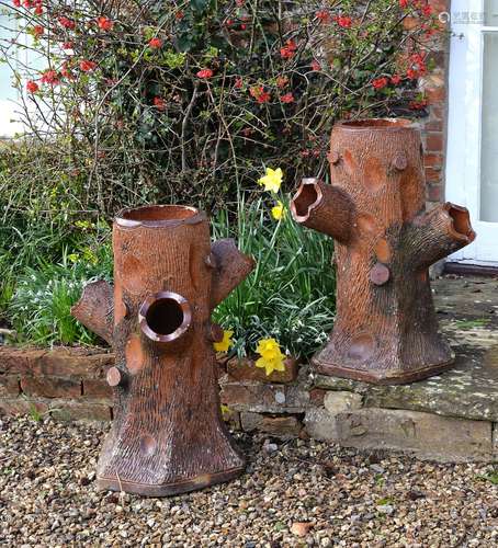 A pair of salt glazed terracotta 'faux bois' strawberry planters, last quarter 19th century