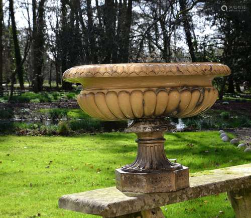 A substantial Victorian salt glazed stoneware garden urn by Lipscombe